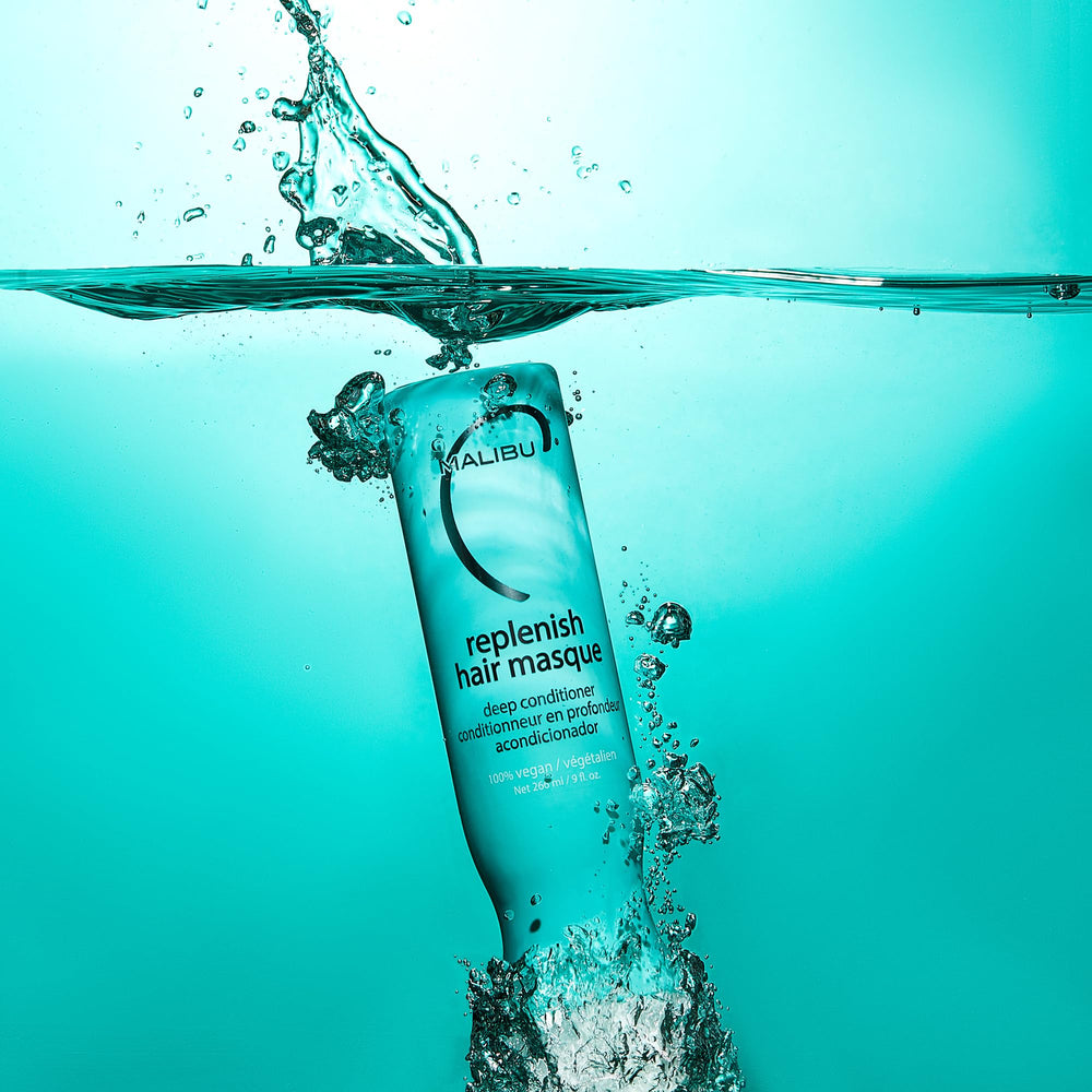 Malibu C Replenish Hair Masque bottle on sink evokes everyday hair care routine.