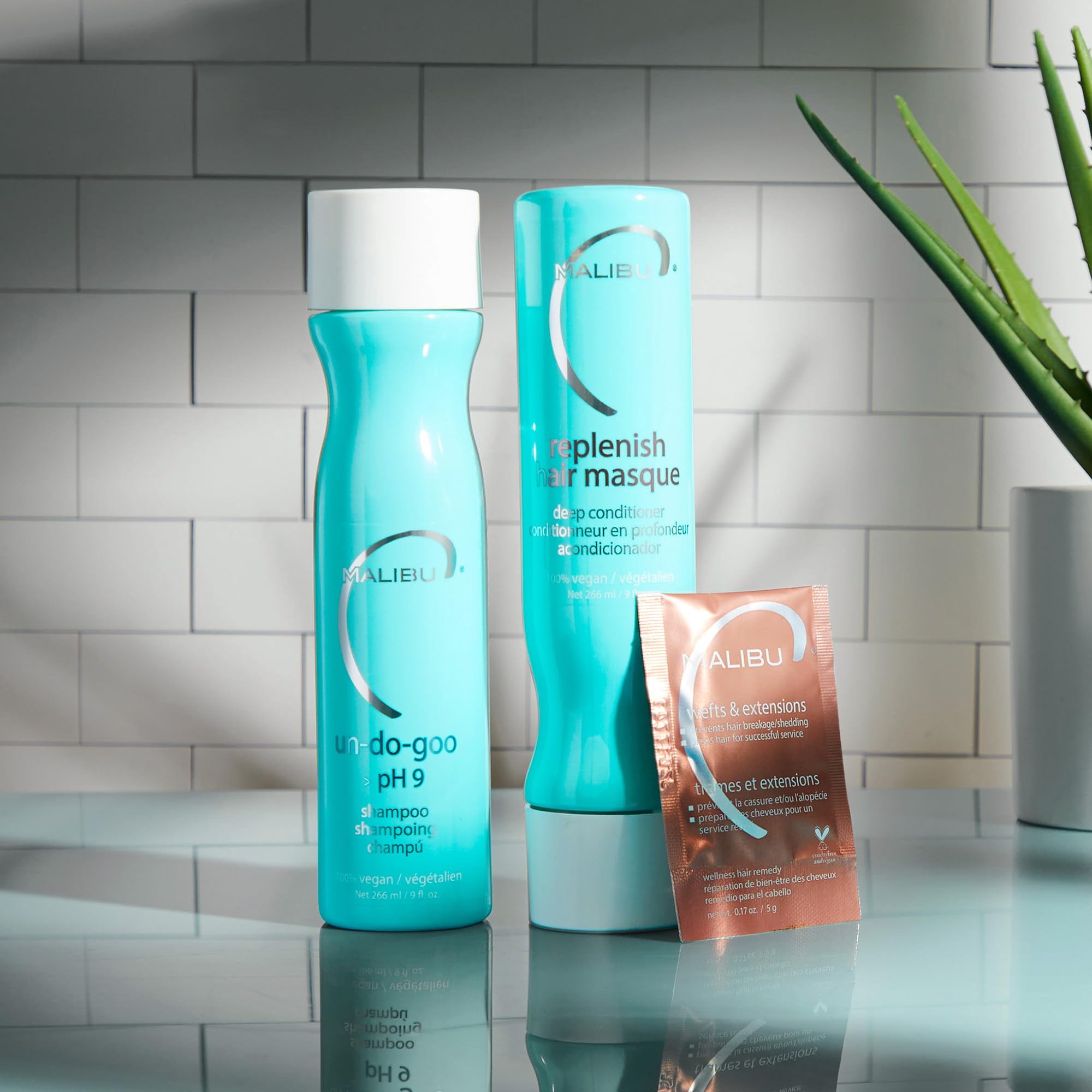 Malibu C Un-Do-Goo Shampoo iconos veganos y libre de crueldad para confianza.