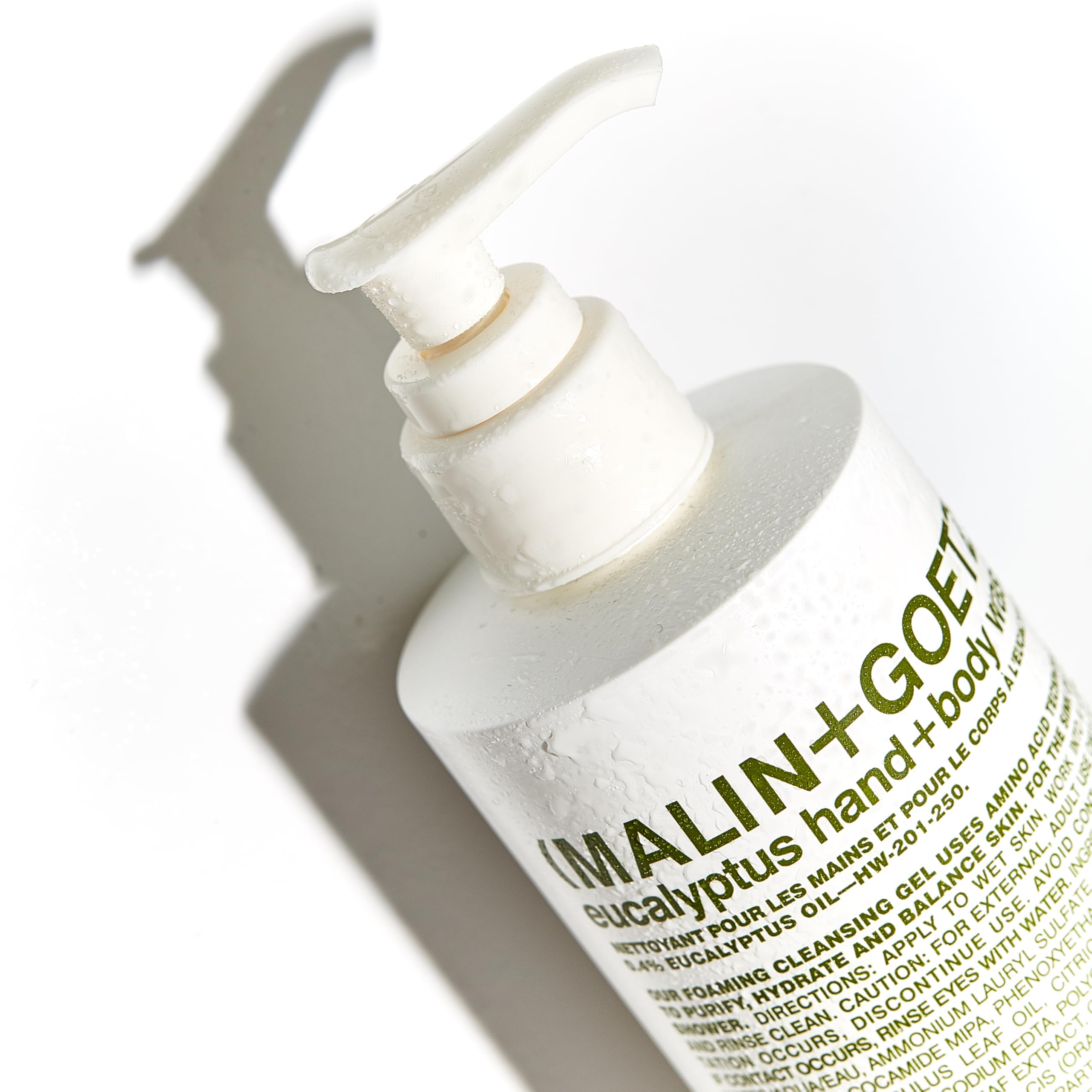 Malin+Goetz pump action captures easy, aromatic foam for shower routines.