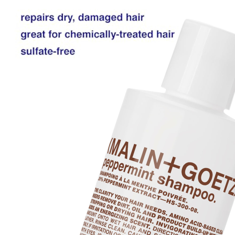 MALIN+GOETZ peppermint shampoo close-up label highlights vegan, sulfate-free formula.