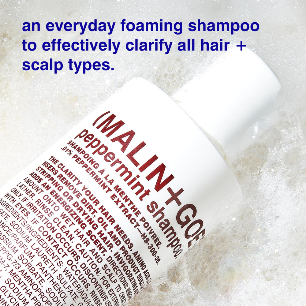 Malin + Goetz Shampoo Clarifying Peppermint foam closeup shows rich lather for gentle cleansing