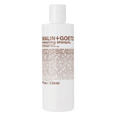 MALIN+GOETZ Hydrating Basil Shampoo bottle shows a daily cleanse that nourishes dry hair.