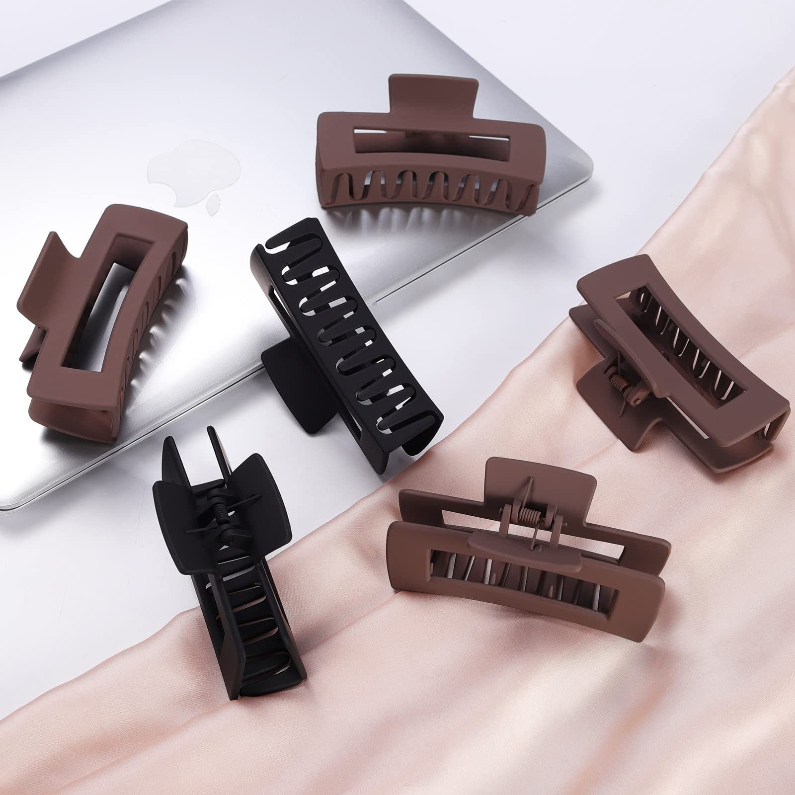 Mandydov large hair clip holds thick hair securely without pulling.