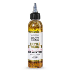 The Mane Attraction extra-strength rosemary-fenugreek oil bottle promotes scalp nourishment