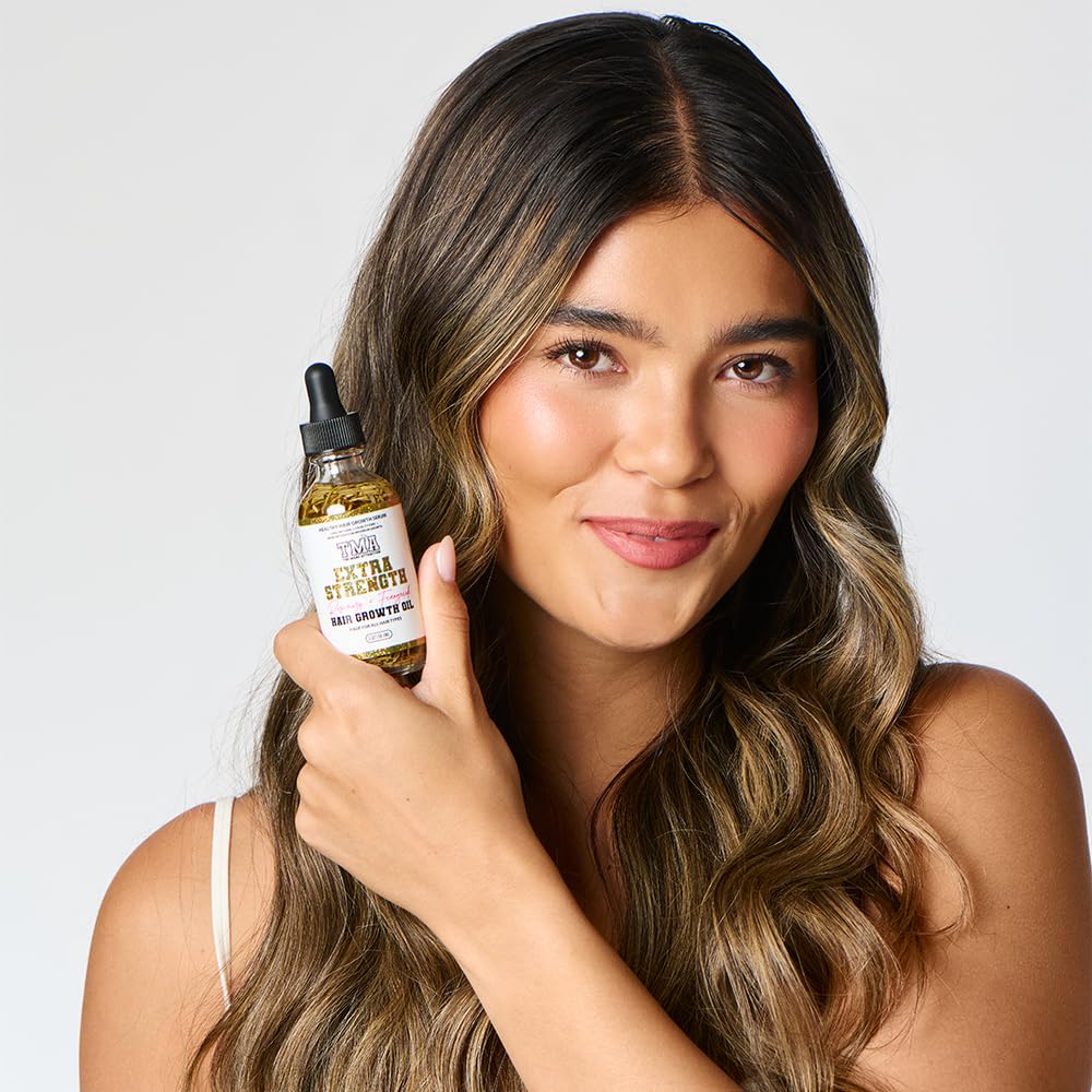 Oil applied to scalp to illustrate soothing hydration and nourishment.