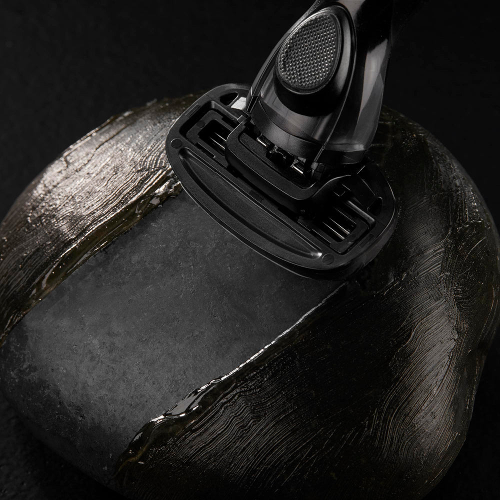 MANSCAPED Crop Shaver wide lubricating strip for smooth glide.