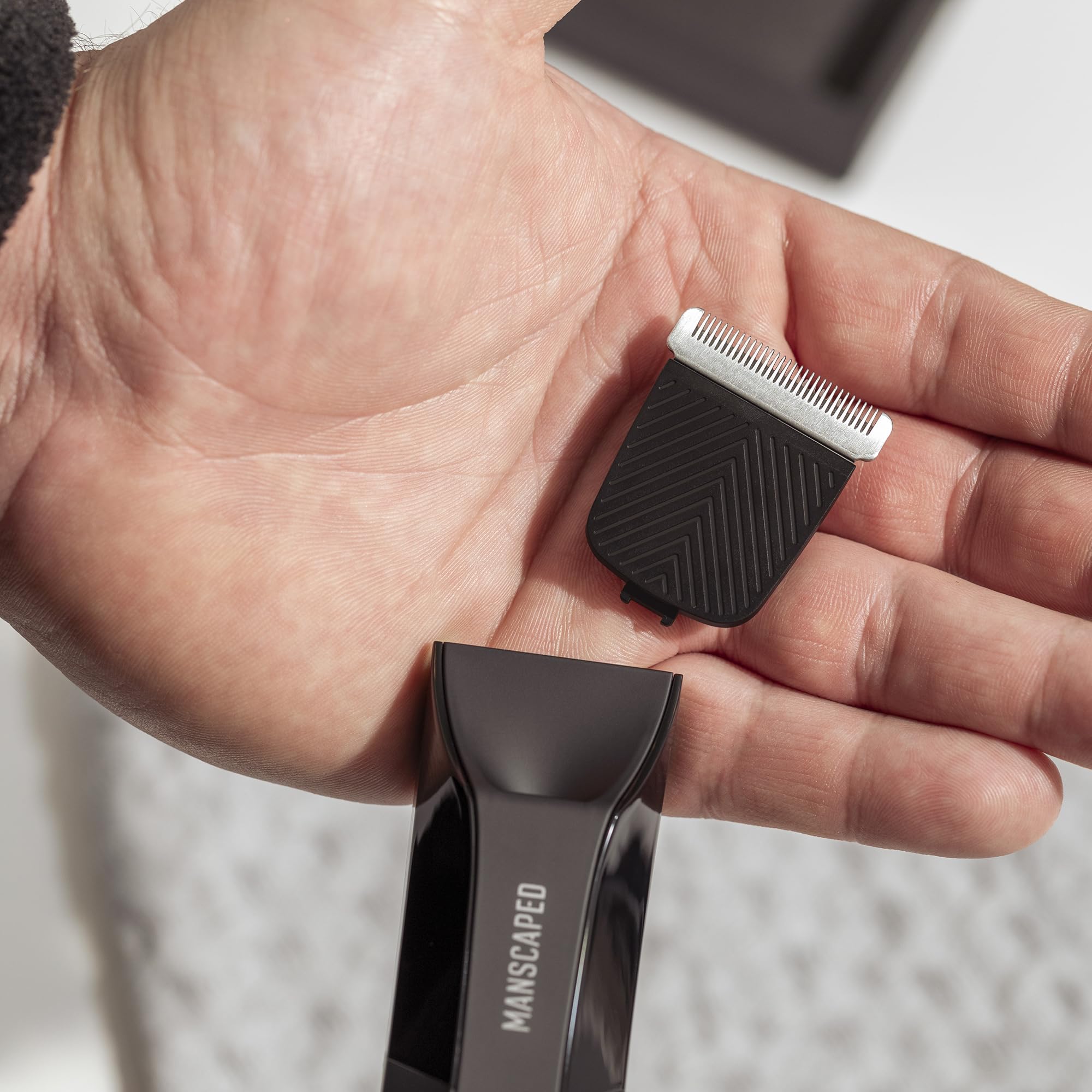MANSCAPED snap-in blade design shown for quick, tool-free replacement.