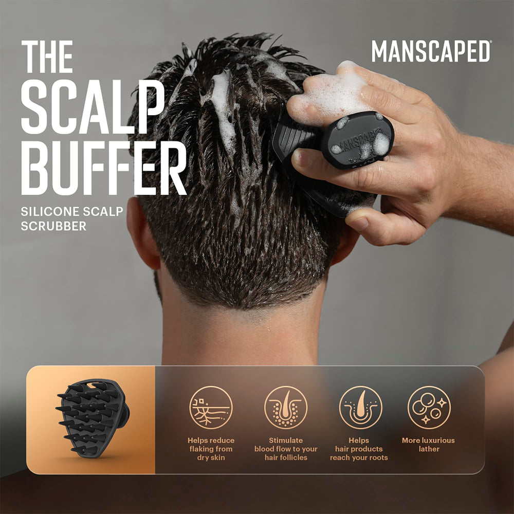 MANSCAPED Scalp Buffer ergonomic grip shown for comfortable scalp massage.