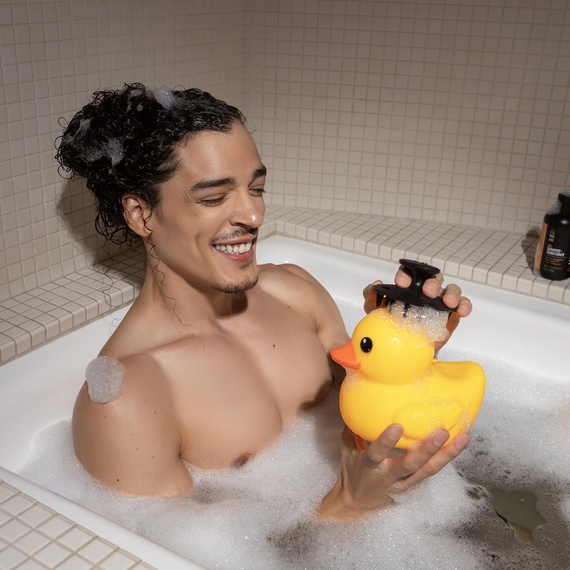 MANSCAPED Scalp Buffer lather with shampoo to cleanse roots.