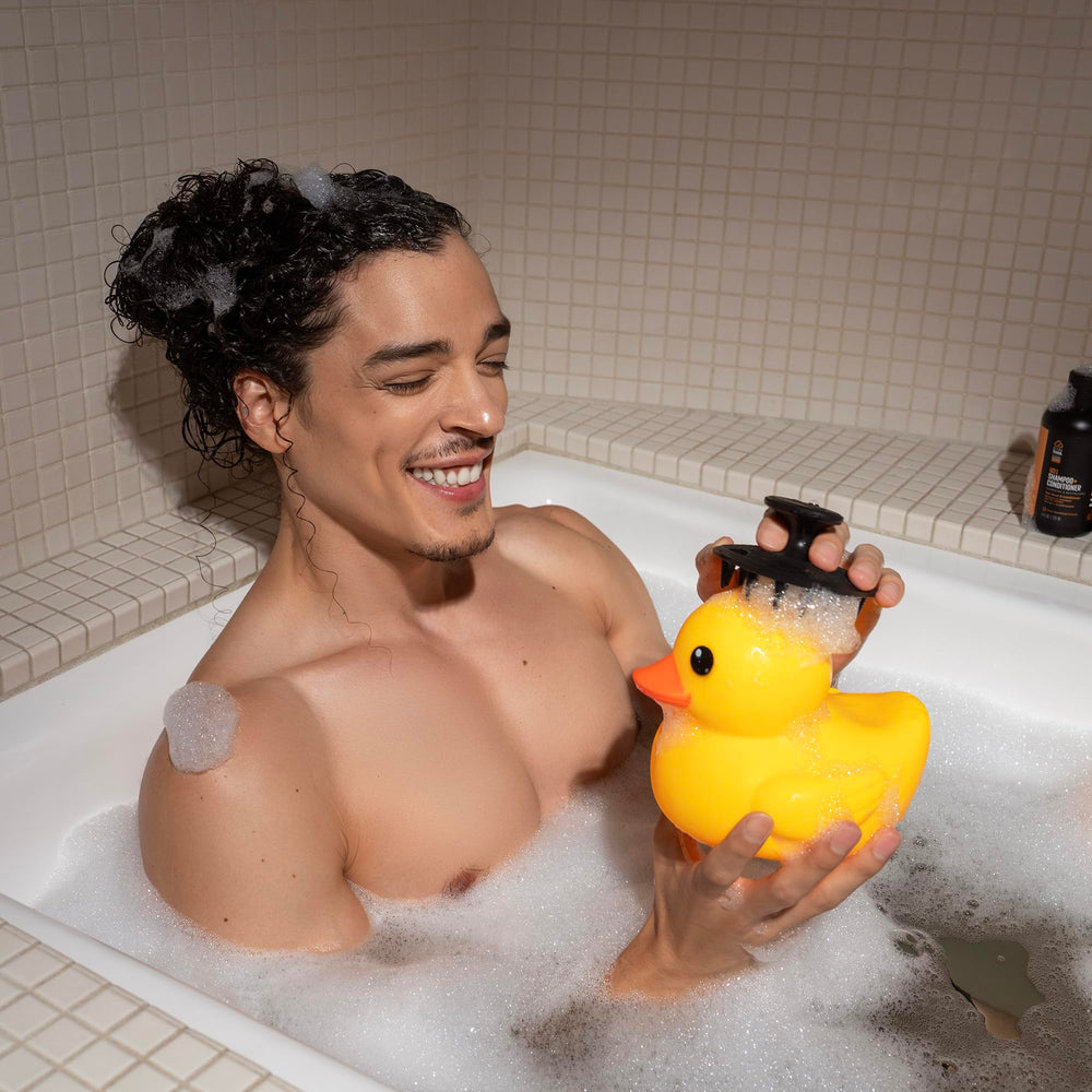 MANSCAPED Scalp Buffer lather with shampoo to cleanse roots.