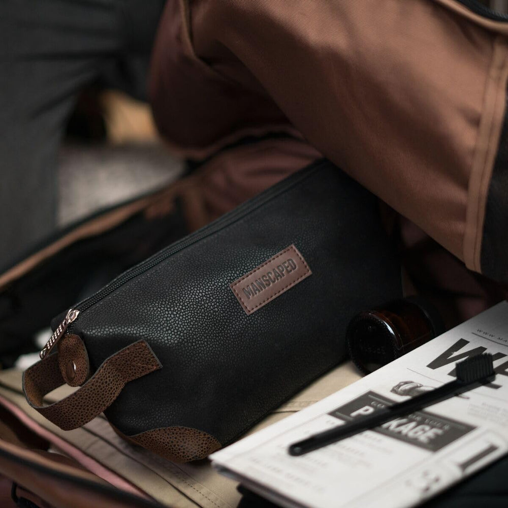 MANSCAPED The Shed water-resistant zipper protects contents during travel.