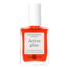 Manucurist Active Glow Cranberry bottle shows mirror-like coral shine.
