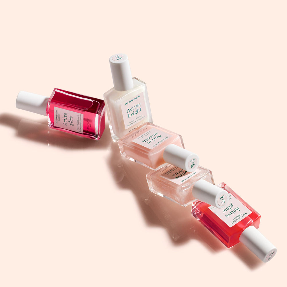 Manucurist Rainbow Active Blueberry Glow bottle offers a cool-rose tint and care.