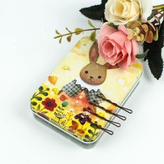 MAORULU mini bobby pins brown case close-up showing smooth coating and tips.