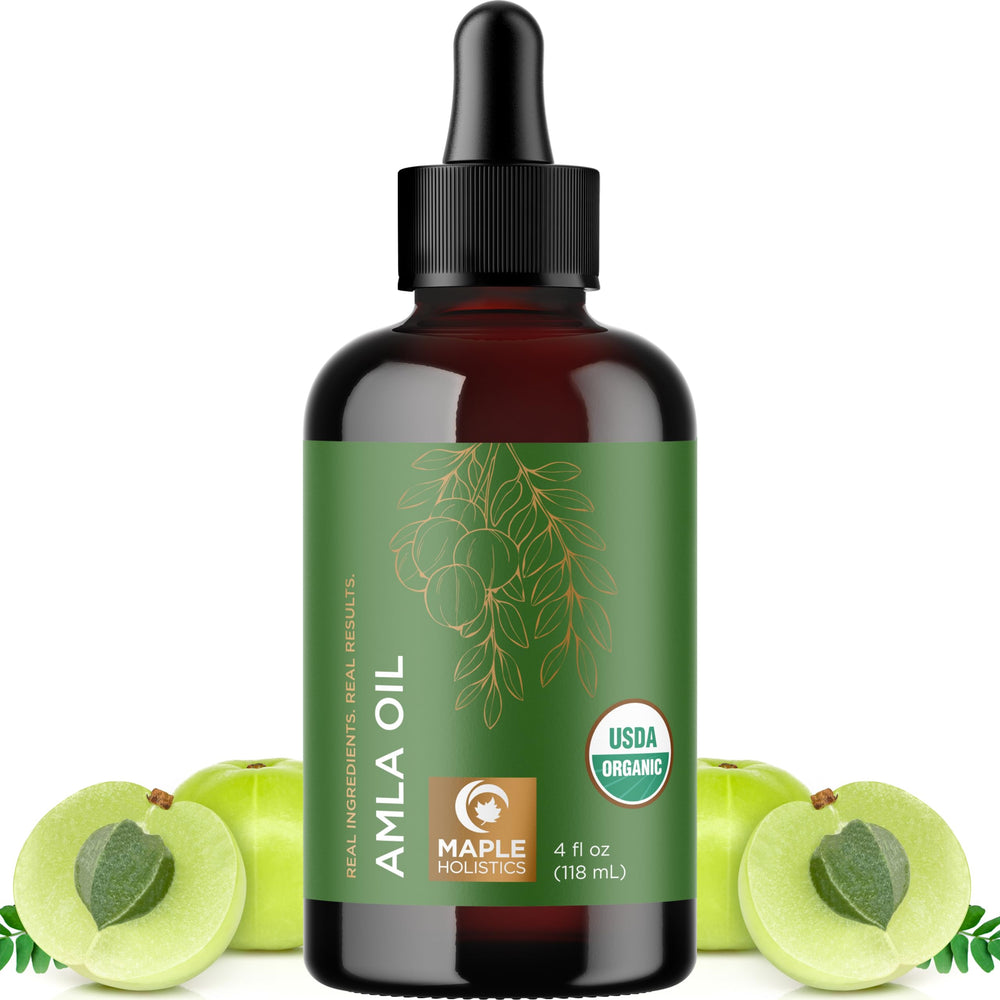 Maple Holistics Amla Oil en bote, brillo y nutrición capilar.