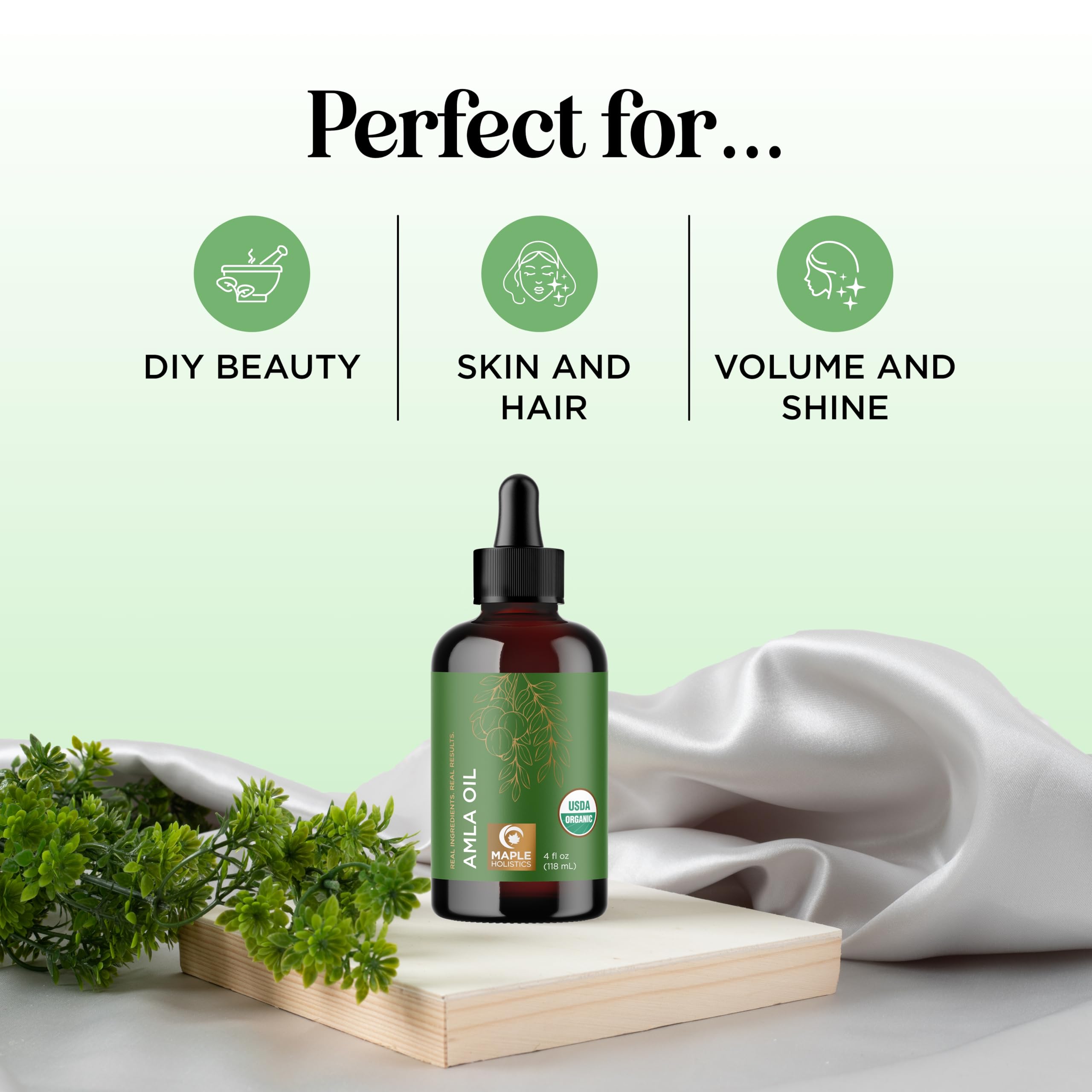 Maple Holistics Amla Oil frasco oscuro conserva nutrientes para cabello suave.