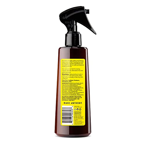 Close-up of Curl It Up Volume Spray on curls showing defined texture without crunch