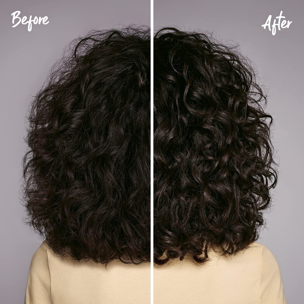 Bottle of Curl It Up Volume Spray with Shea Butter and Avocado Oil for moisture