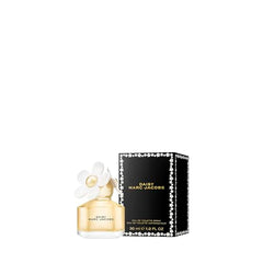 Marc Jacobs Daisy EDT bottle sunlight reflection: radiant bottle glow suggests a sunny mood for daytime wear.