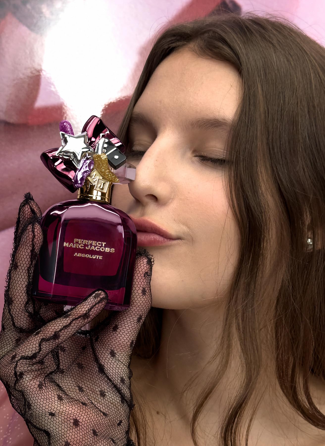 Close-up of Marc Jacobs Perfect Absolute nozzle detail showing refinement.