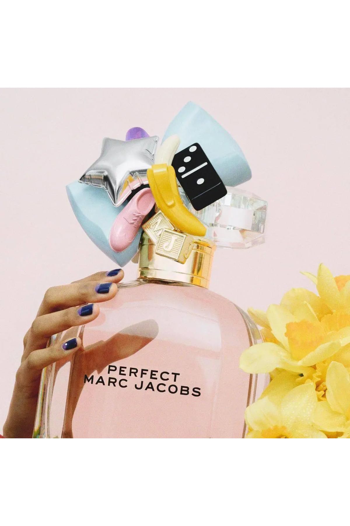 Marc Jacobs Perfect EDP base notes cedarwood and cashmeran for warmth