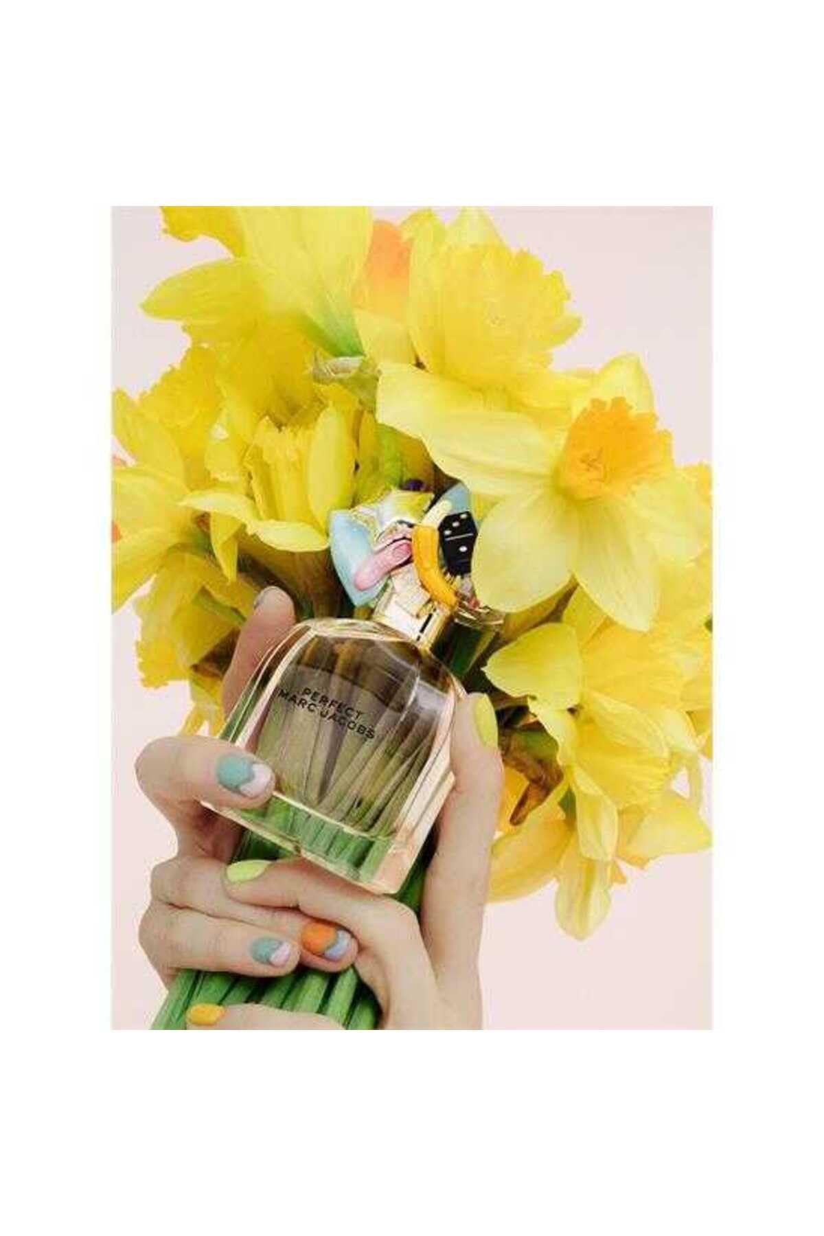 Marc Jacobs Perfect EDP bottle with charms highlighting self-expression