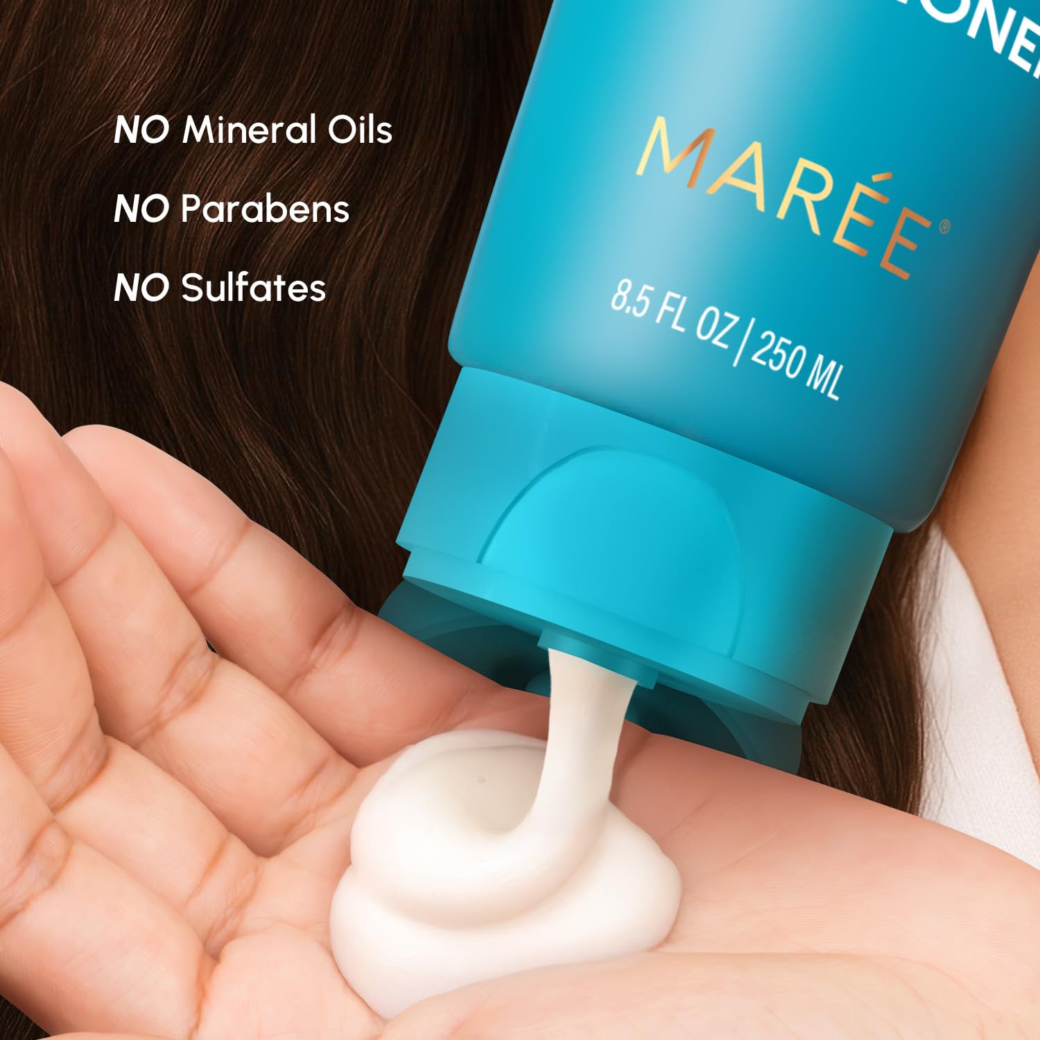 Hair appears shiny and healthy after washing with MAREE conditioner.