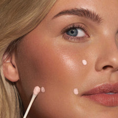 Mario Badescu Drying Lotion cotton swab dab for precise blemish targeting.