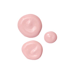 Mario Badescu Drying Lotion pink sediment signals overnight spot treatment readiness.