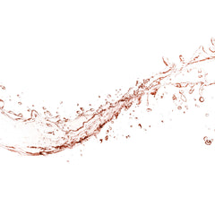 Close-up of Mario Badescu rosewater spray mist refreshing the skin.