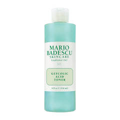 Mario Badescu Glycolic Toner bottle on a clean surface highlighting brightening potential.