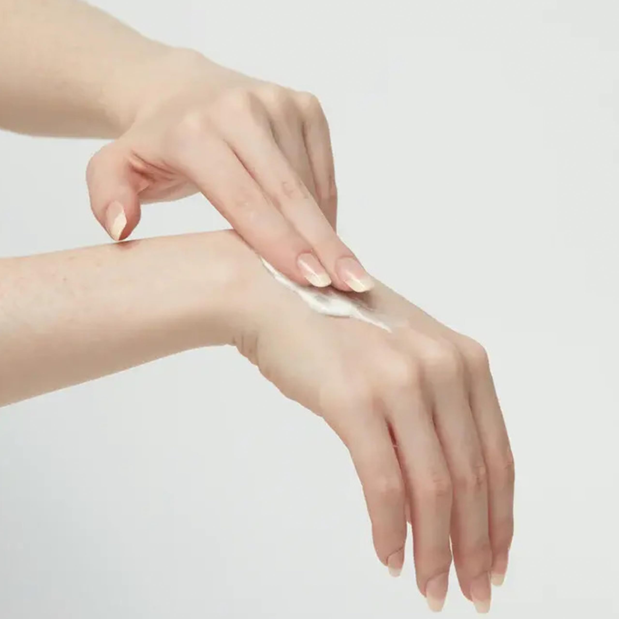 Non-greasy feel of Mario Badescu Rose Hand Cream on dry hands.