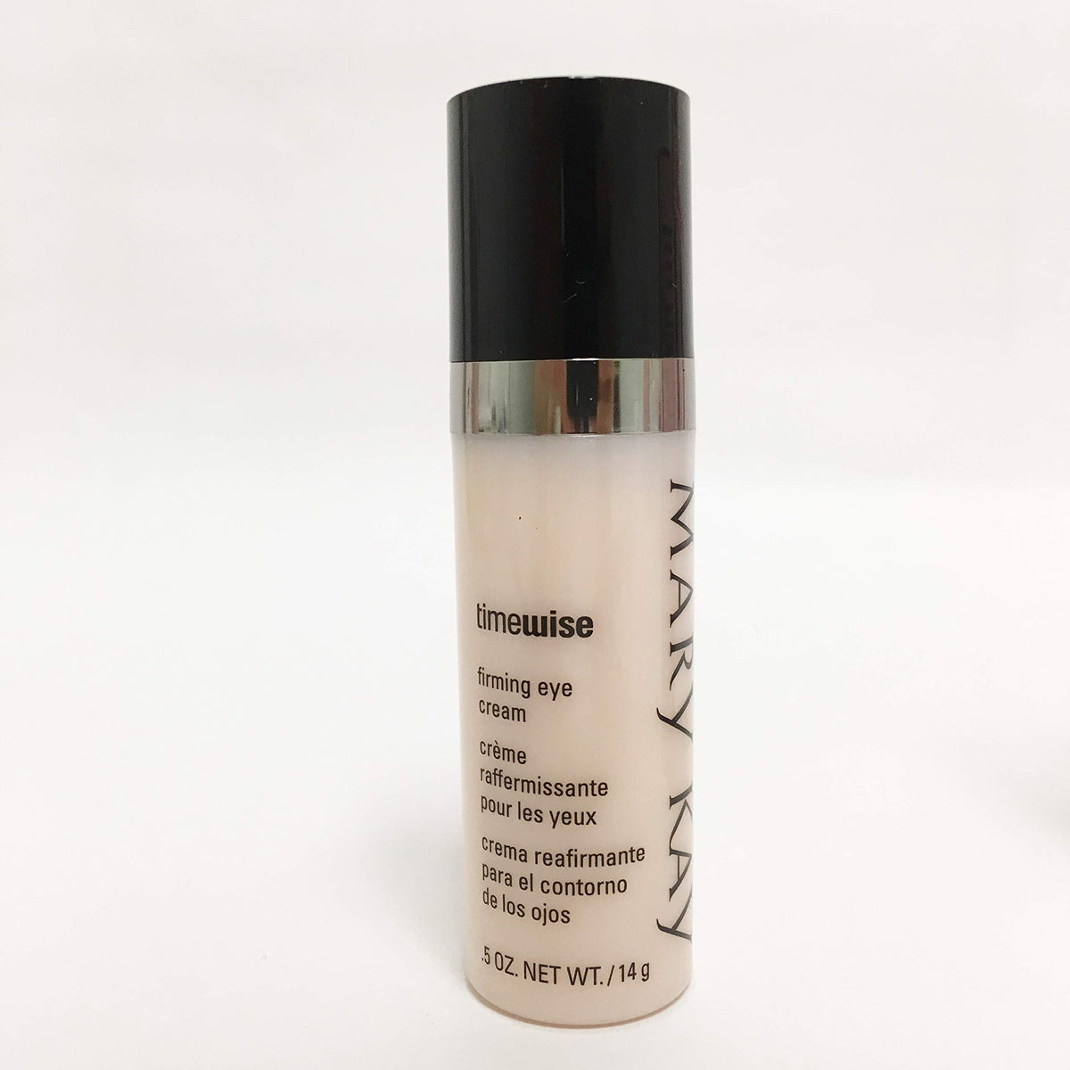 Mary Kay TimeWise eye cream bottle highlights anti-aging benefits for the eye area.