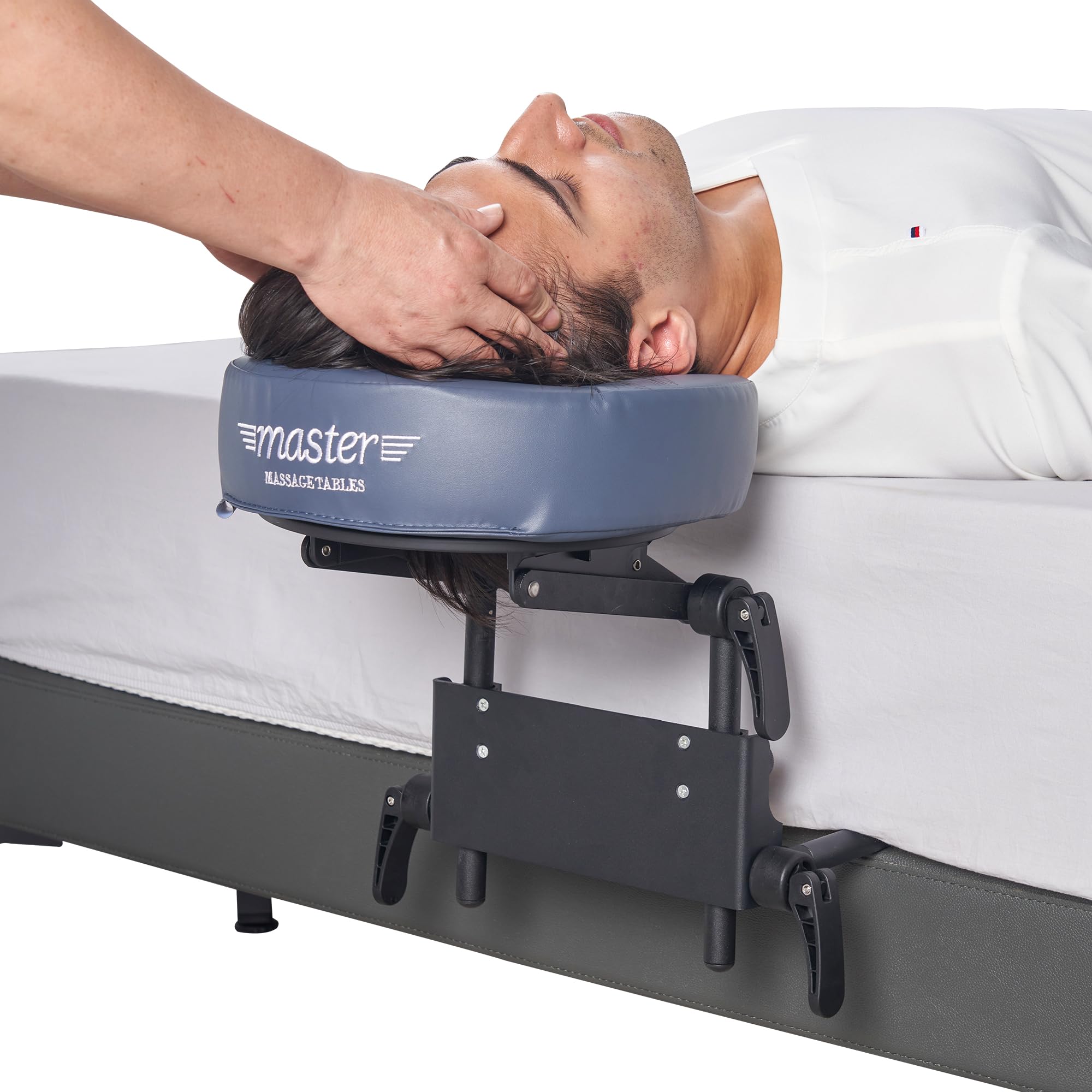 Master Massage crescent face cushion offers comfortable support during sessions.