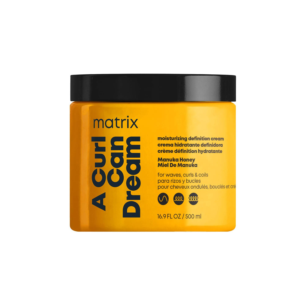 Matrix A Curl Can Dream bottle close-up demonstrates deep hydration for curls.