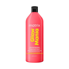 MATRIX Glow Mania Shampoo bottle pour for color protection and shine boost.