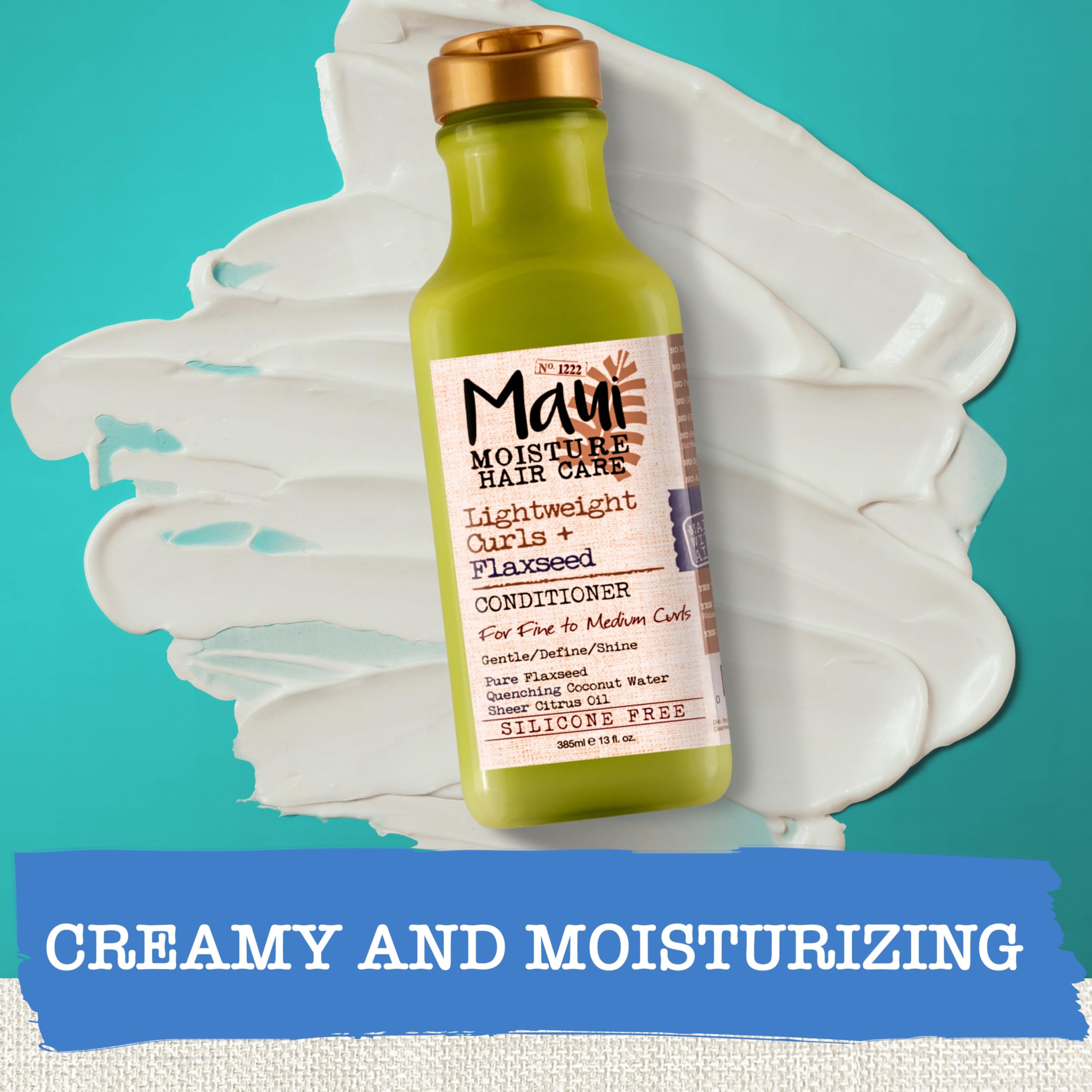 Maui Moisture Lightweight Curls + Flaxseed Conditioner applied to hair ends for hydration.
