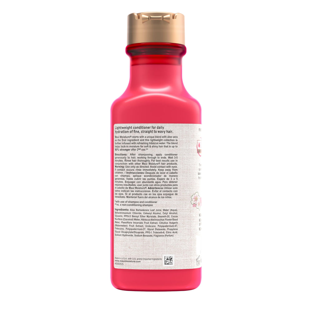 Aloe vera and coconut imagery emphasized on Maui Moisture conditioner packaging.