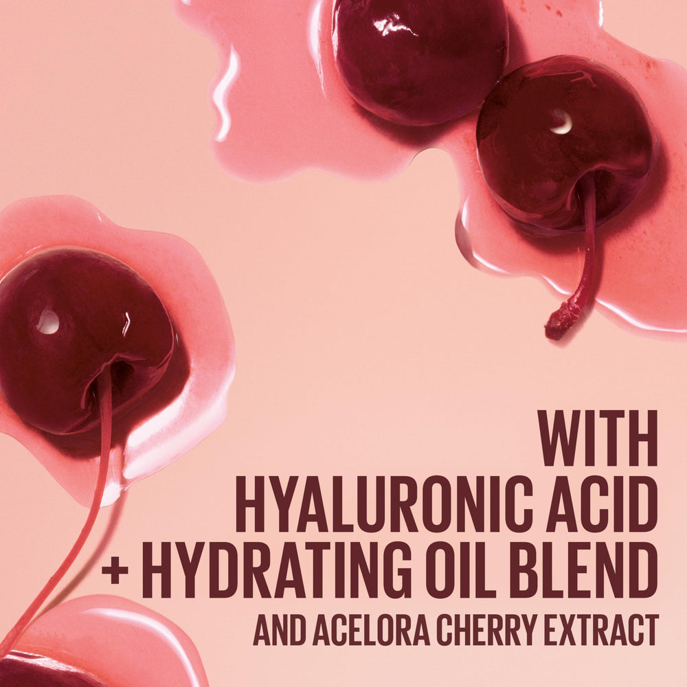 Maybelline Lifter Glaze Berry Haze on lips for moisturized smoothness.