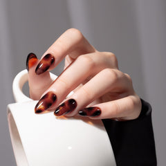 MAYCHAO tortoise-sheer gel polish bottle and brush for precise application