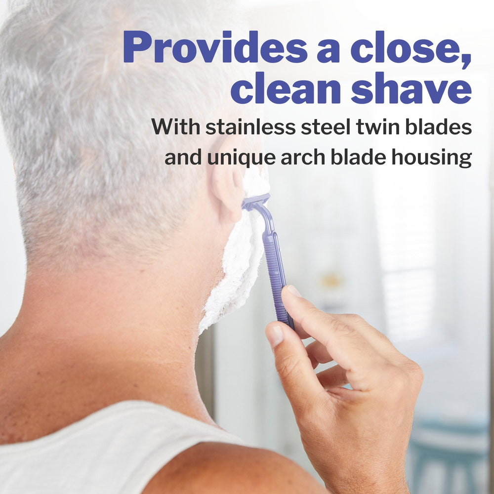 McKesson disposable razor safety cap close-up for hygienic handling.