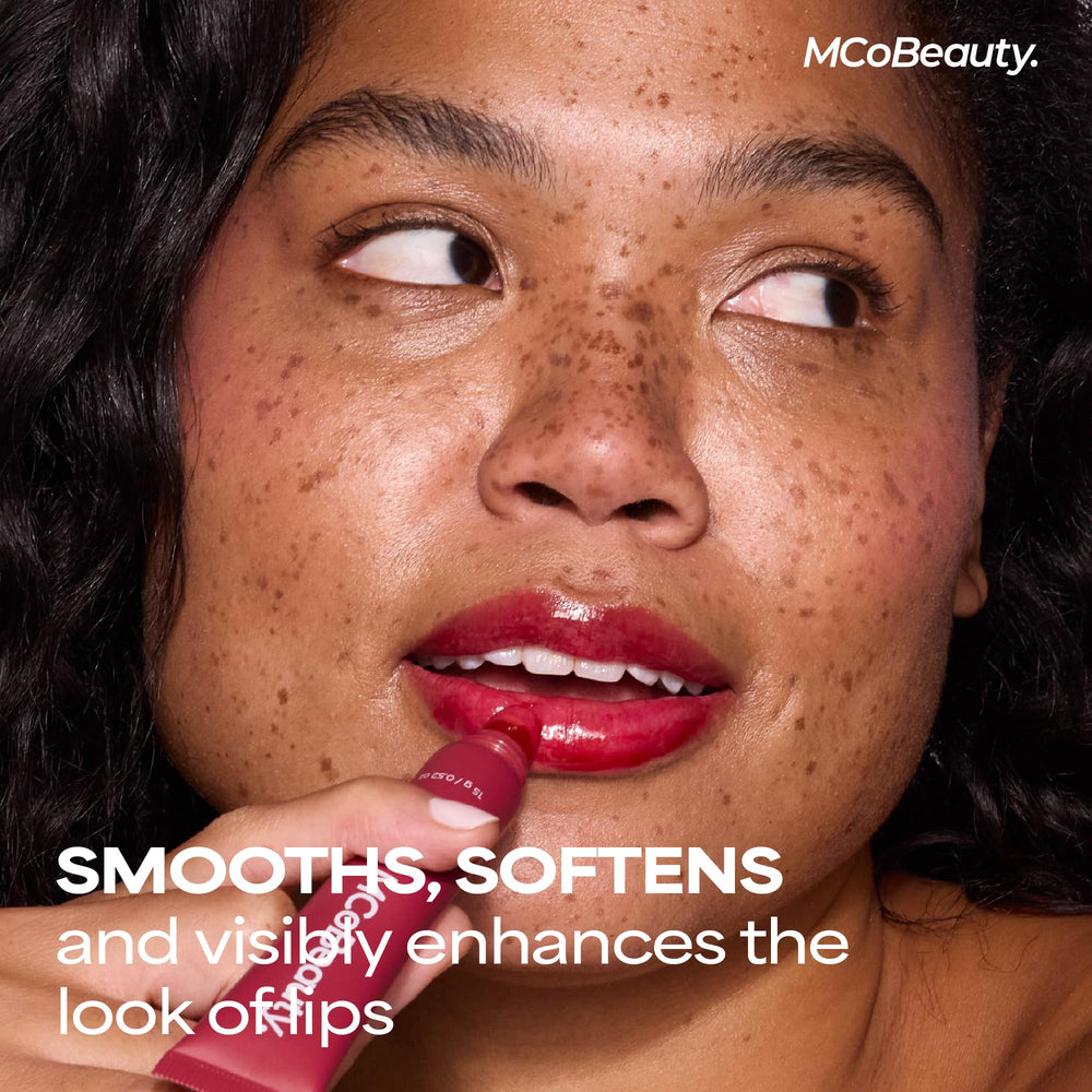 MCoBeauty Peptide Lip Treatment Vanilla Brulee being applied for a glossy, conditioning layer.