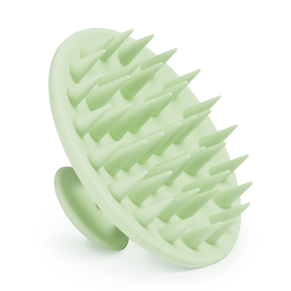 Meartchy silicone scalp massager grass green held in hand for cleansing