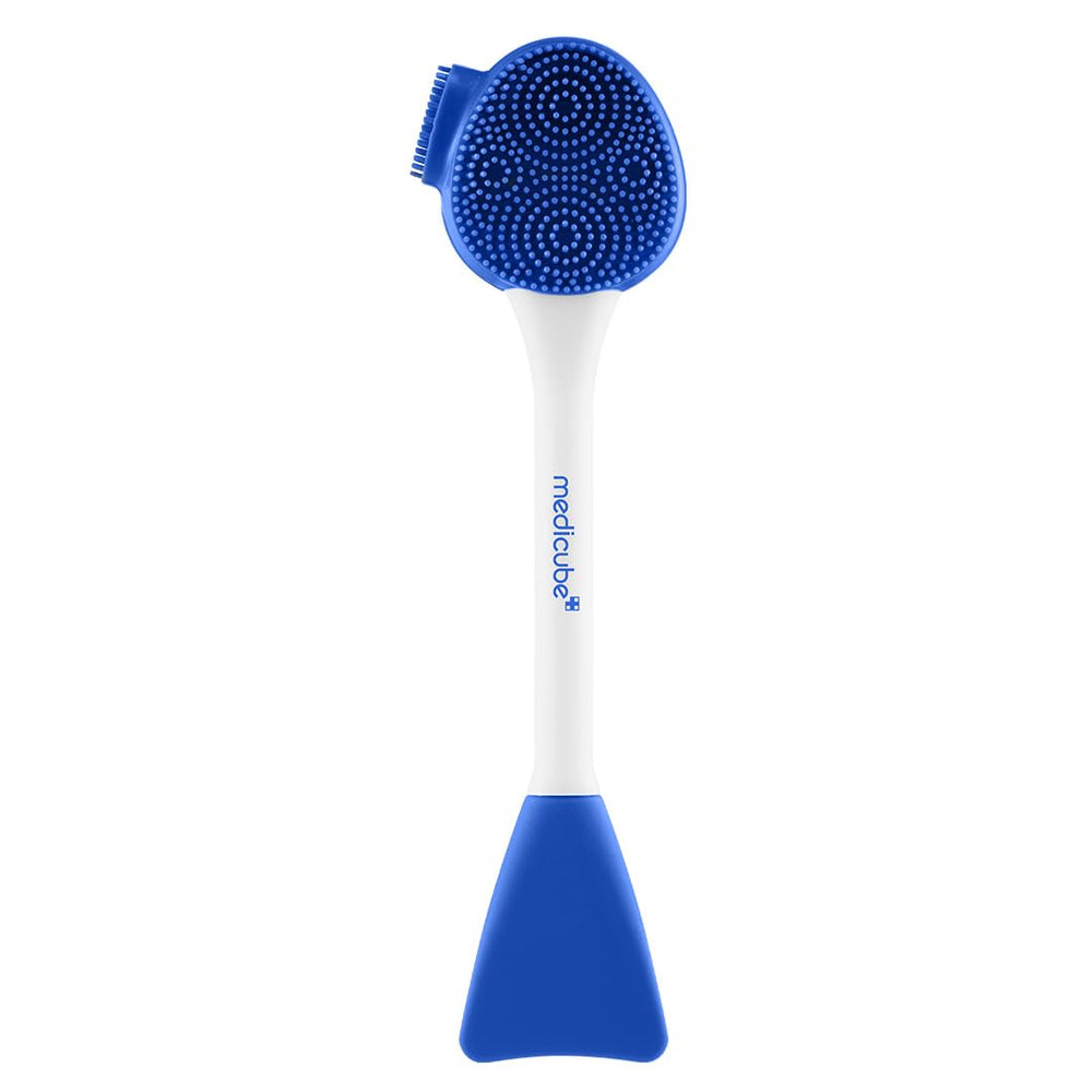 Medicube Multi Pore Brush flat head applying masks for even coverage and gentle cleansing.