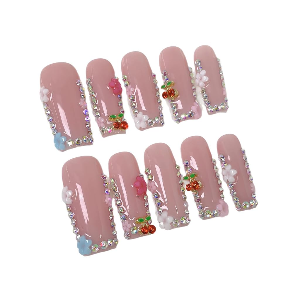 Meemooron diseños florales en uñas postizas para una apariencia delicada.