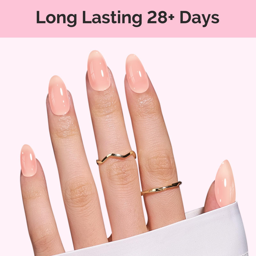 MelodySusie Jeweliver Nude Gel Polish finished nails in a soft pastel shade.