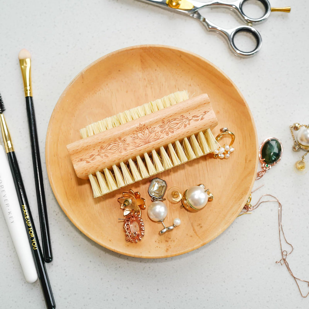 Menesia hand-held scrubber in action during daily grooming routine