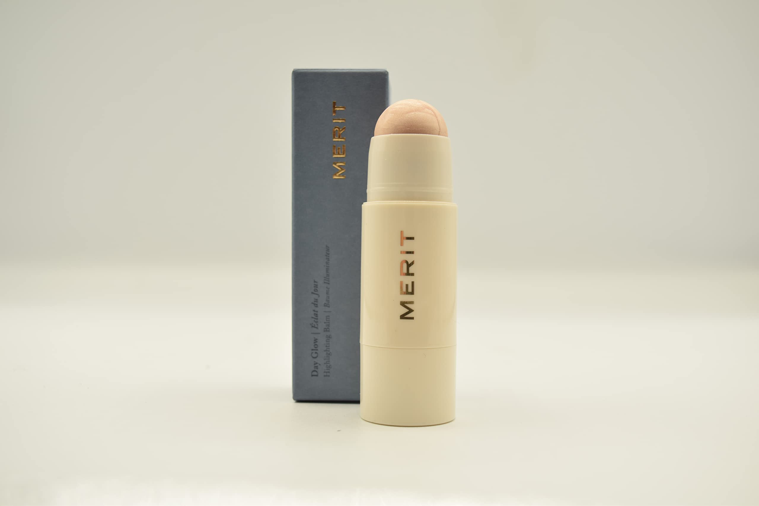 Merit Day Glow Dewy Highlighting Balm Cava swatch on skin for daytime radiance