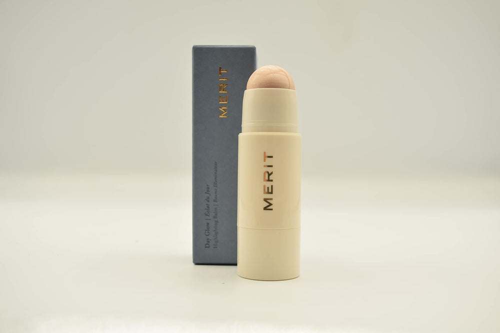 Merit Day Glow Dewy Highlighting Balm Cava swatch on skin for daytime radiance
