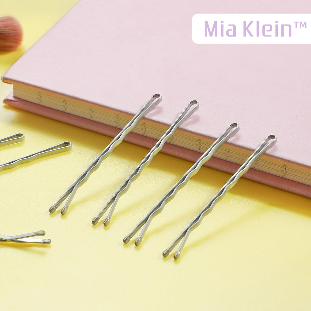 Pinzas Mia Klein duraderas de metal resisten uso diario sin deformarse.